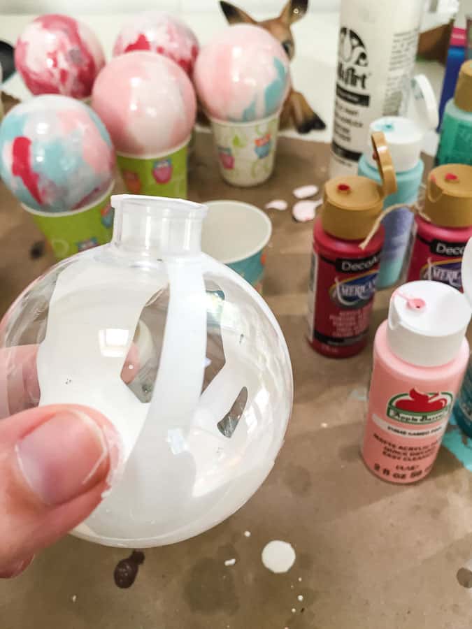 Pour paint inside ornaments