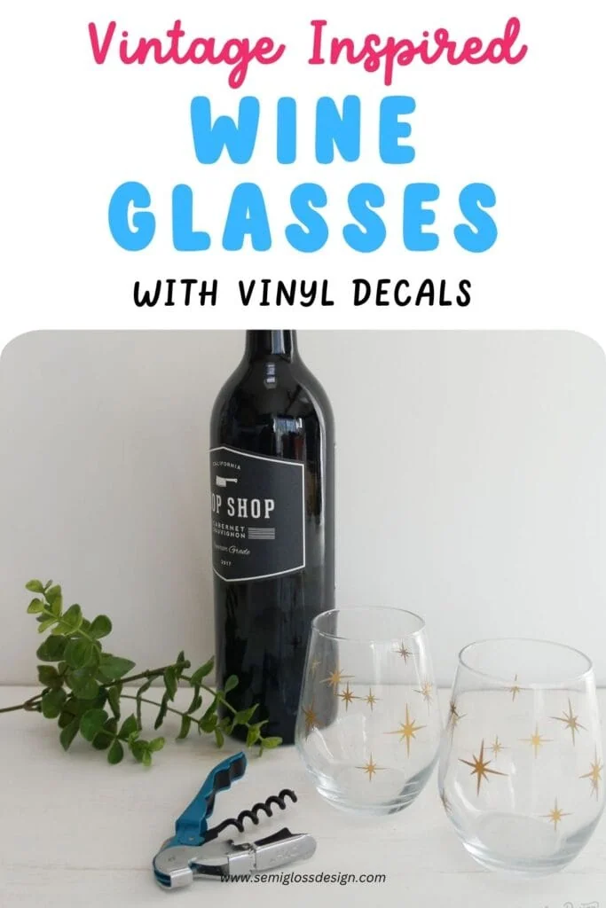 bottle of wine and stemless wine glasses with gold starburst designs