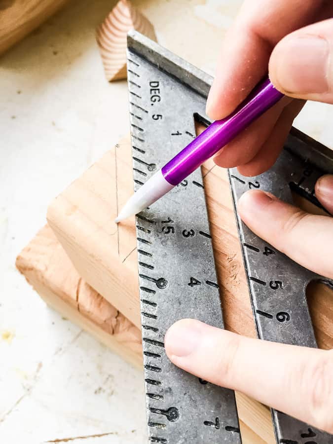 using a speed square to draw roof angles