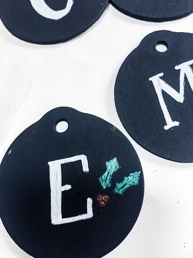 use chalk markers to stamp on name tags