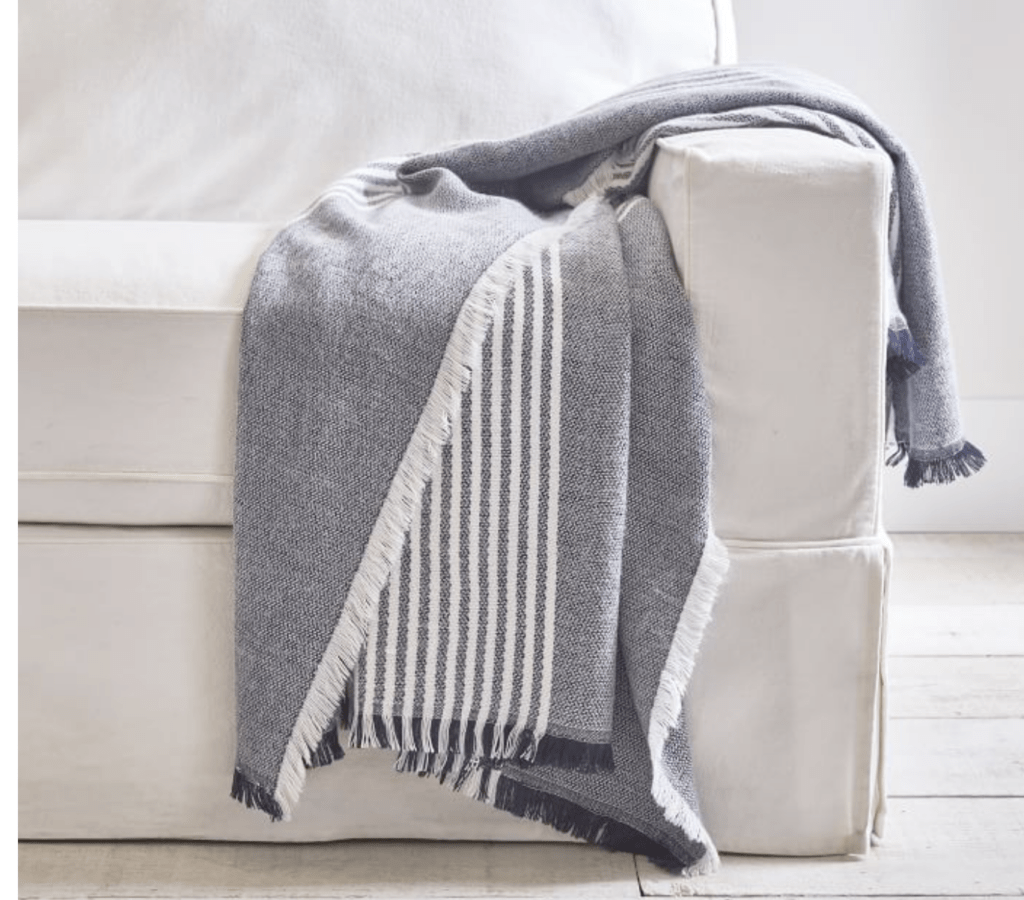 black and white striped throw blanket on sofa