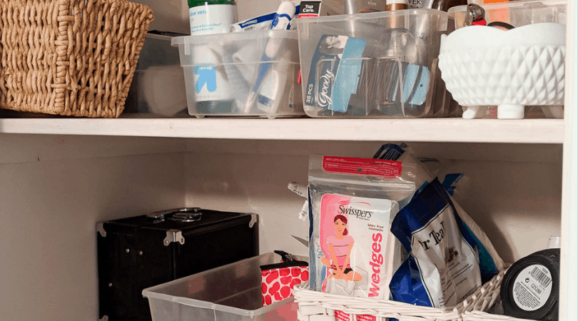 organized bathroom closet after
