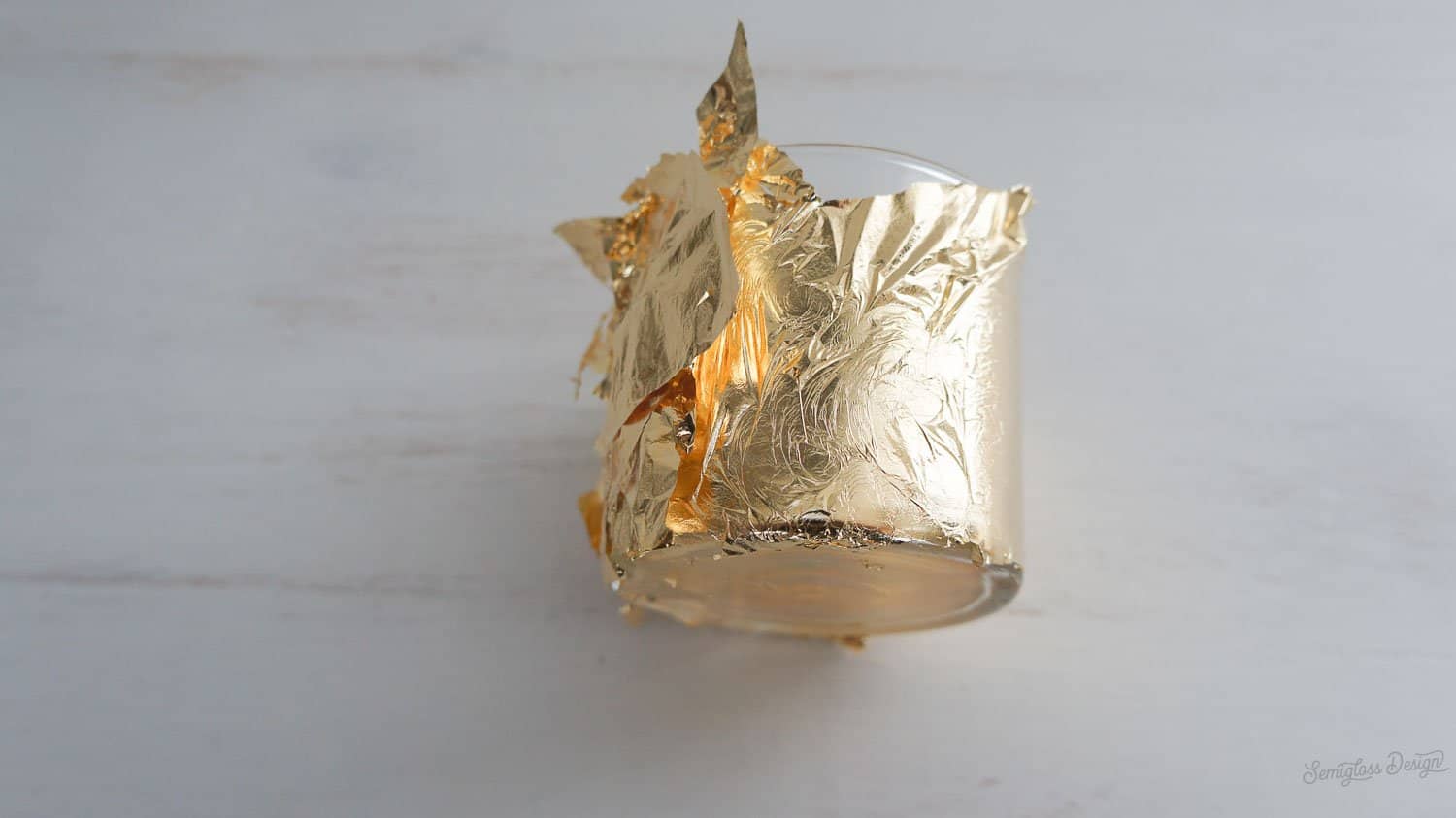 gold leaf on candle holder