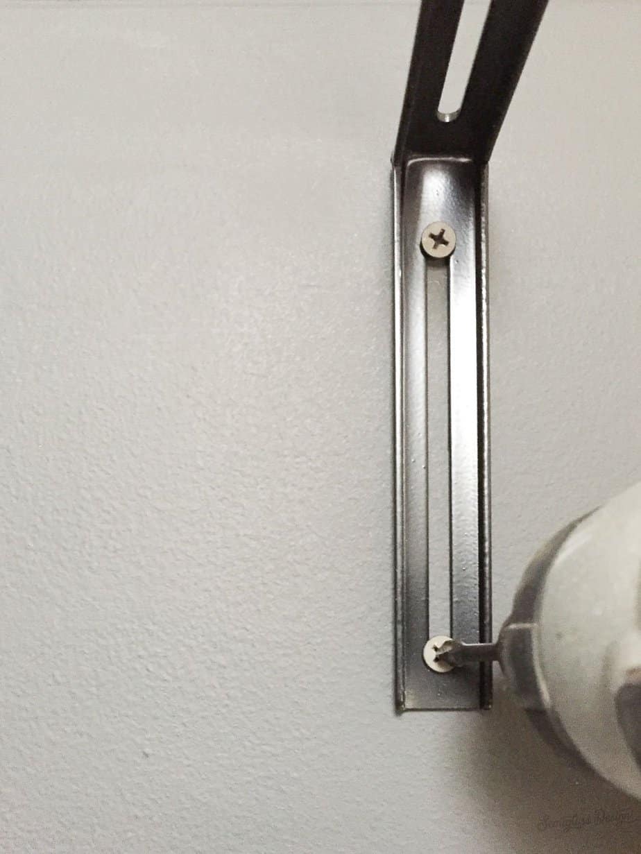 attach curtain rod bracket to wall