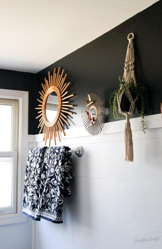 bathroom with black walls and white shiplap