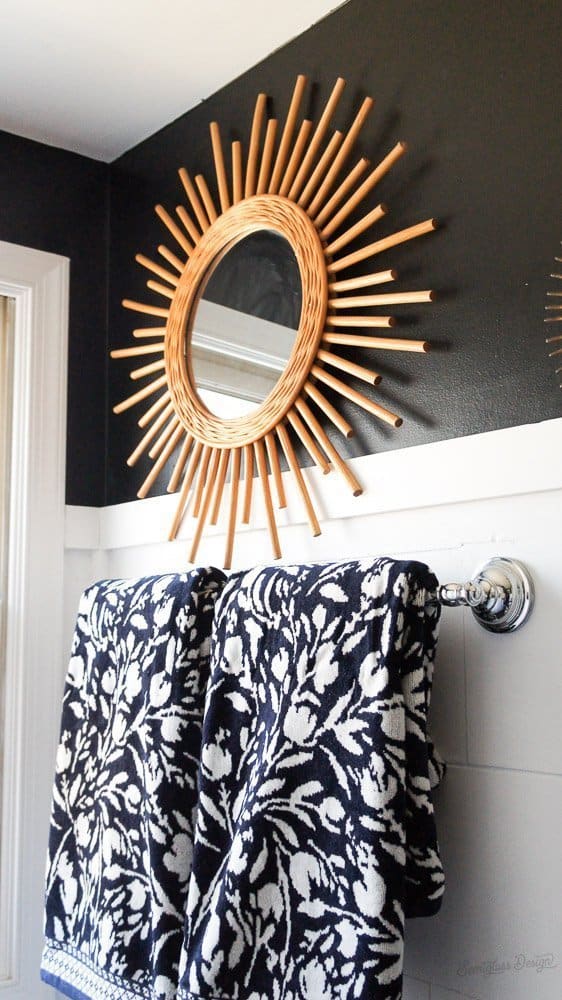 patterned towels and boho mirror