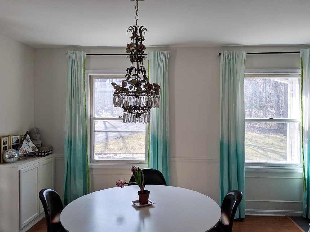 Dining room painted in Behr Swiss Coffee