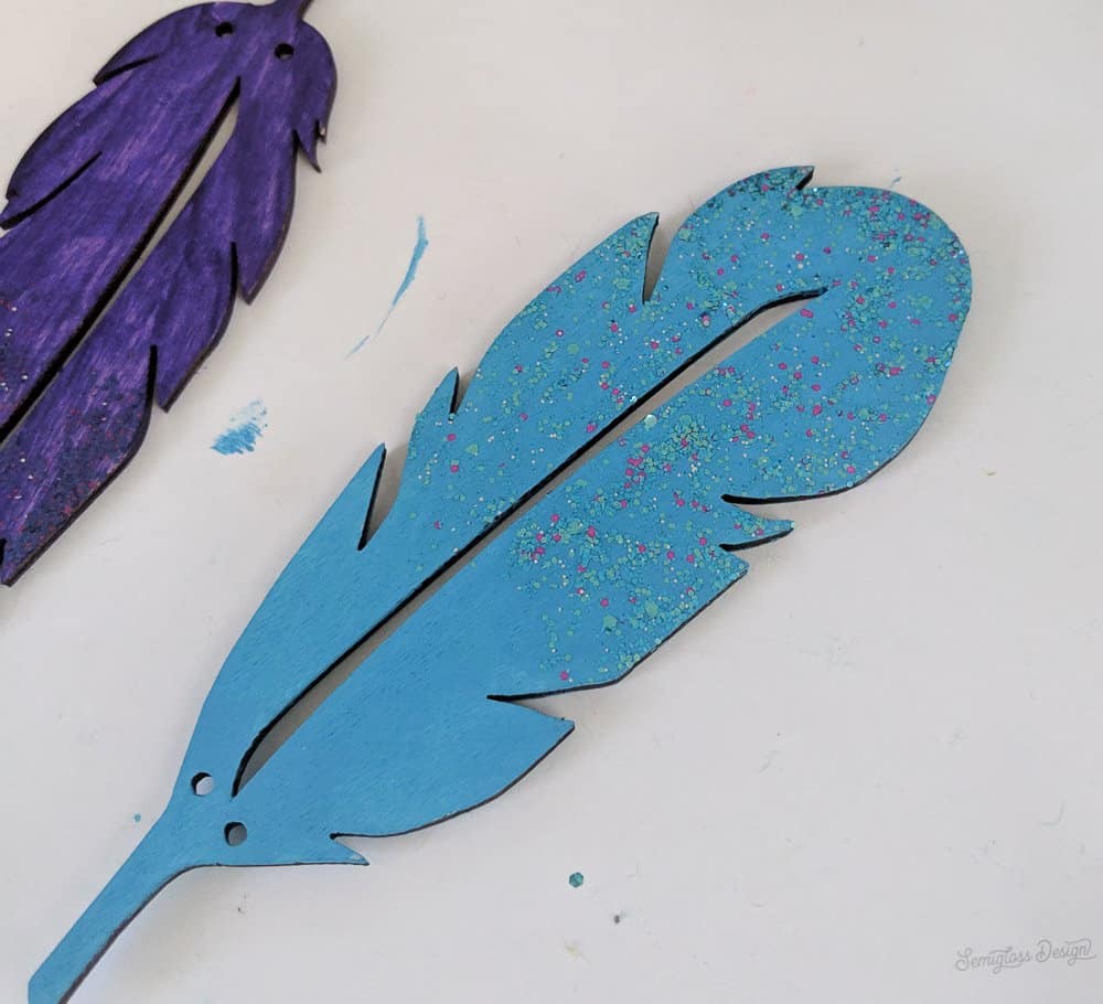 glitter paint on feathers