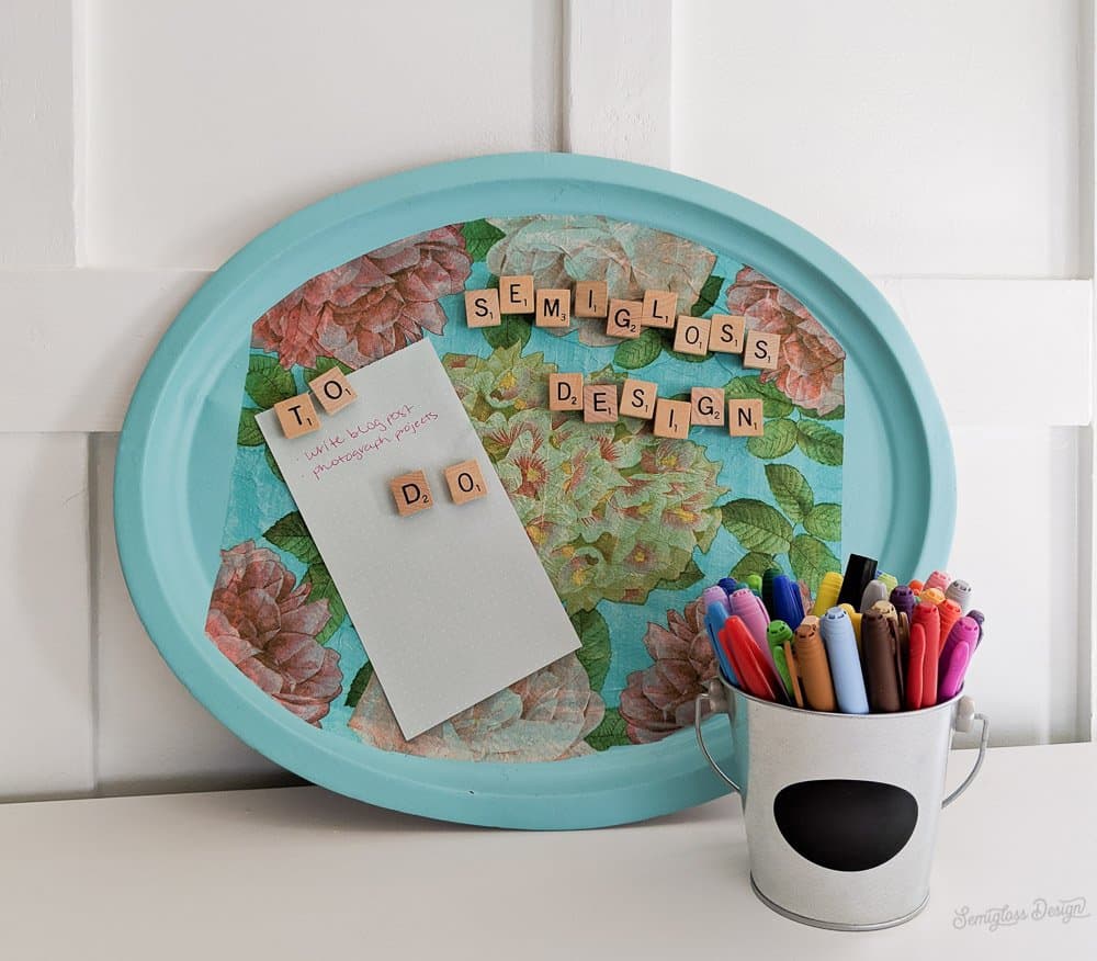 metal tray upcycled into DIY magnetic board