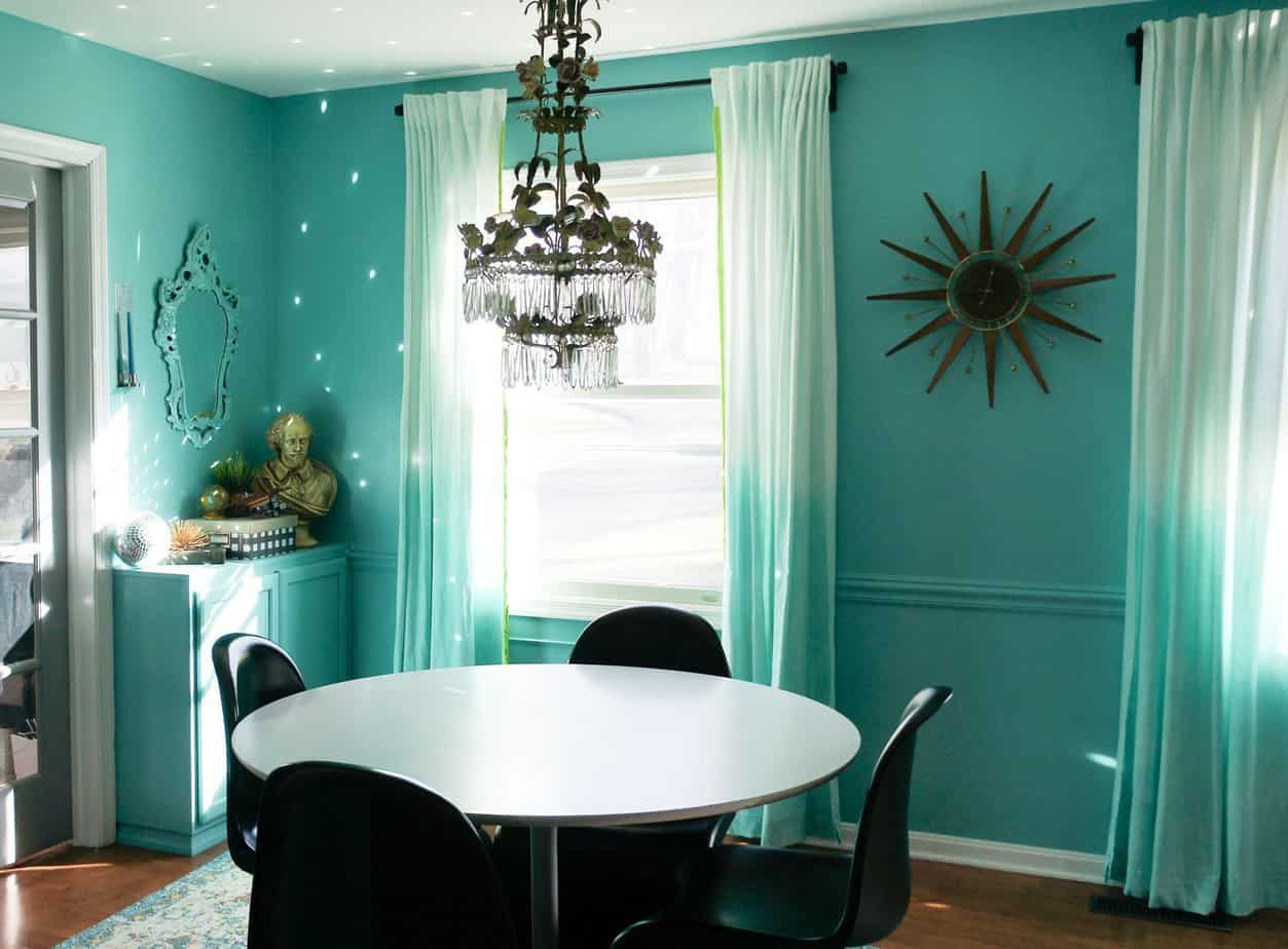 dining room before with teal walls