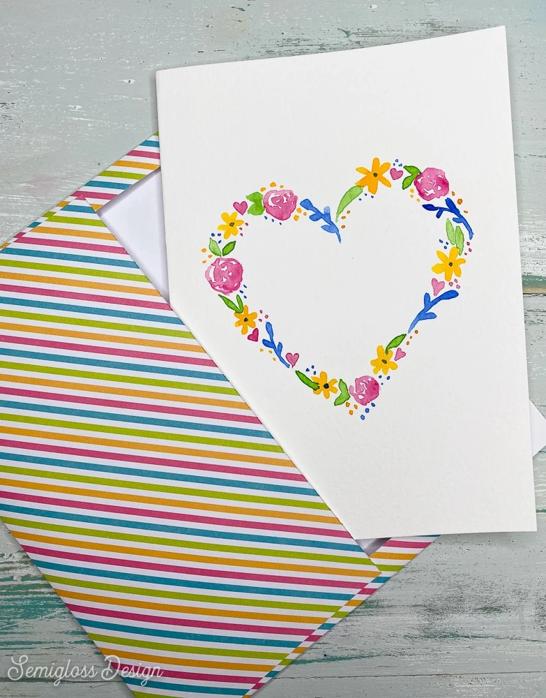 striped envelope with watercolor heart card