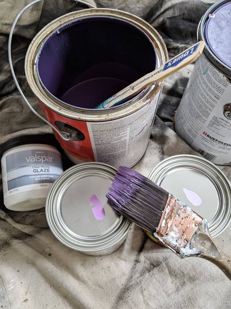 purple paint cans