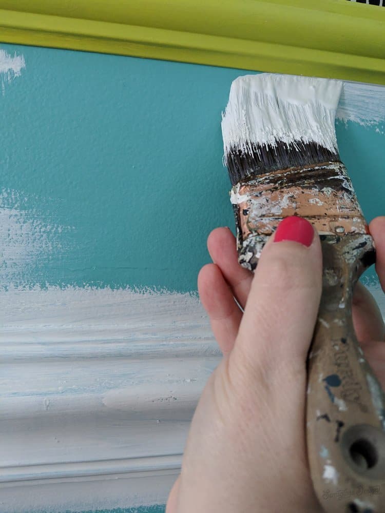 an angled paint brush helps with cutting in