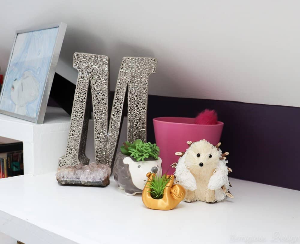 hedgehog and sloth planters in boho bedroom