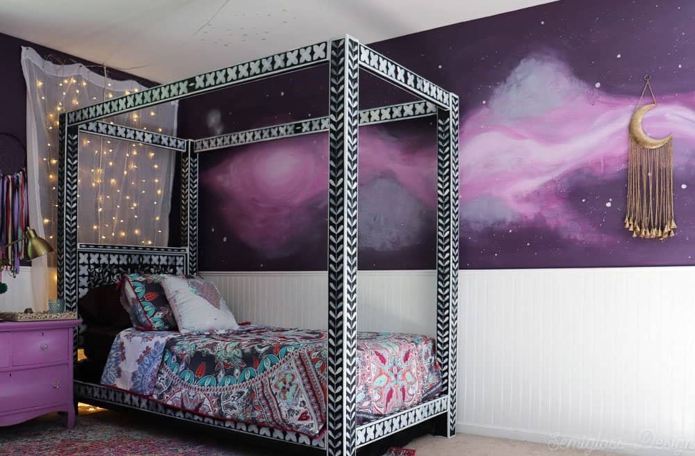purple boho bedroom with galaxy mural and bone inlay canopy bed
