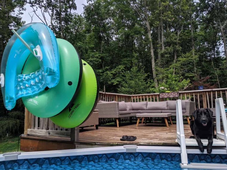 pool storage using pvc pipe on deck with cute black lab