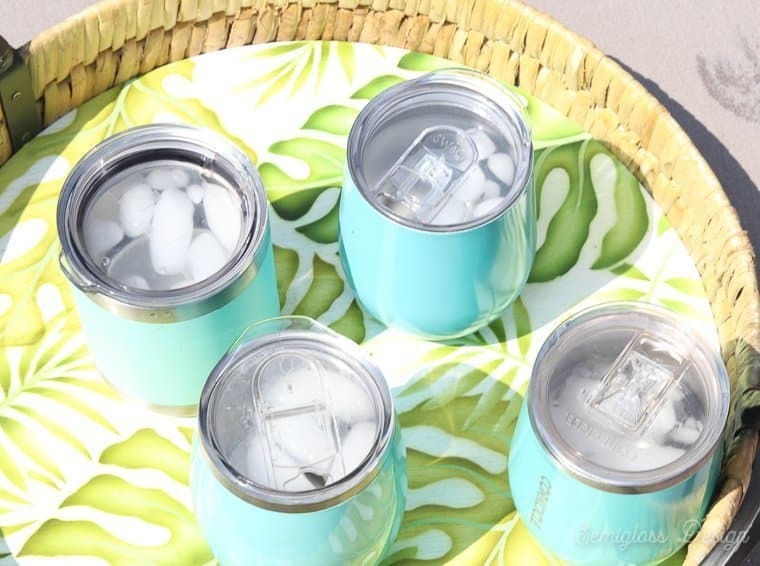 ice in insulated tumblers on a hot day