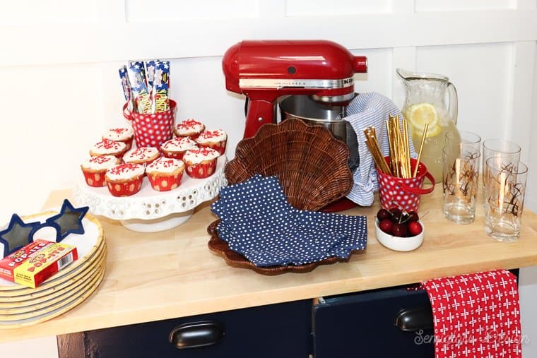 red white and blue kitchen island set up for party