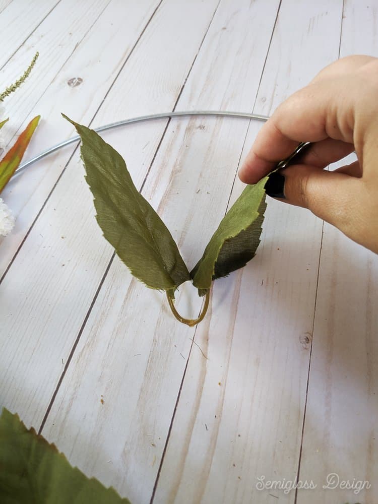 use leaves to fill in bare spots on wreath