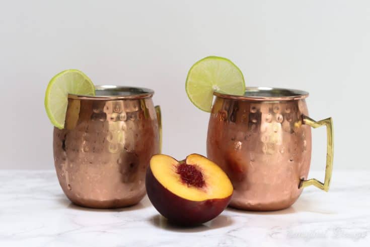 peach moscow mules in copper mugs