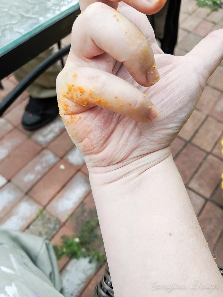 messy hands from carving pumpkins