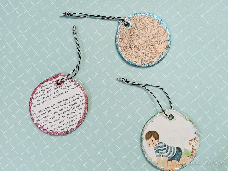 wood ornaments decoupaged with vintage paper