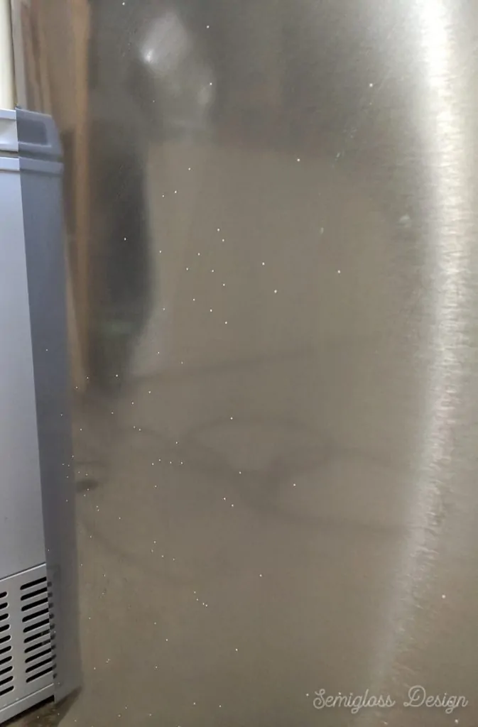 paint overspray spots on washing machine