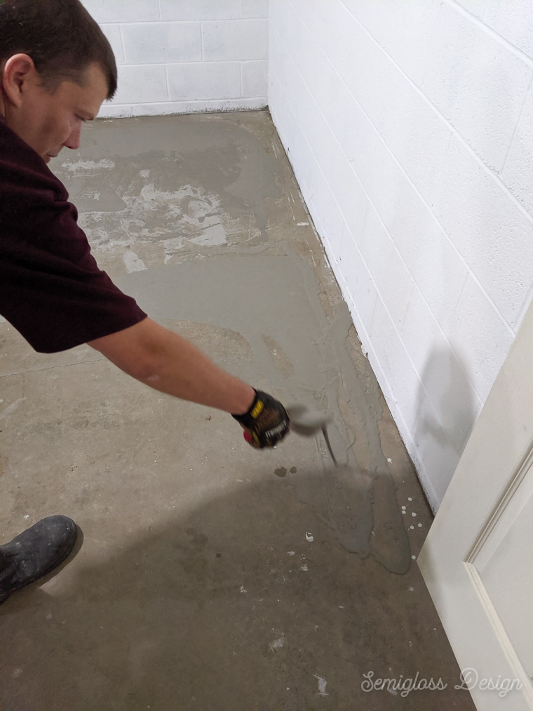 pouring concrete mixture on floor