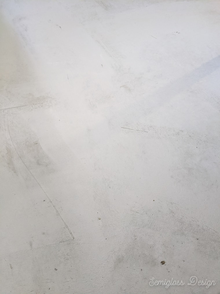 refinishing a concrete floor with a skim coat