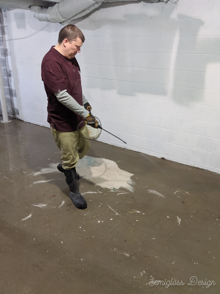 spraying neutraclean on the floor