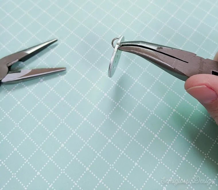 attaching o ring to jewelry blank to make pendant