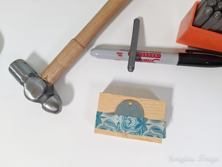using washi tape to make straight line on metal jewelry blank