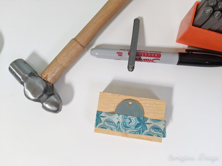 using washi tape to make straight line on metal jewelry blank
