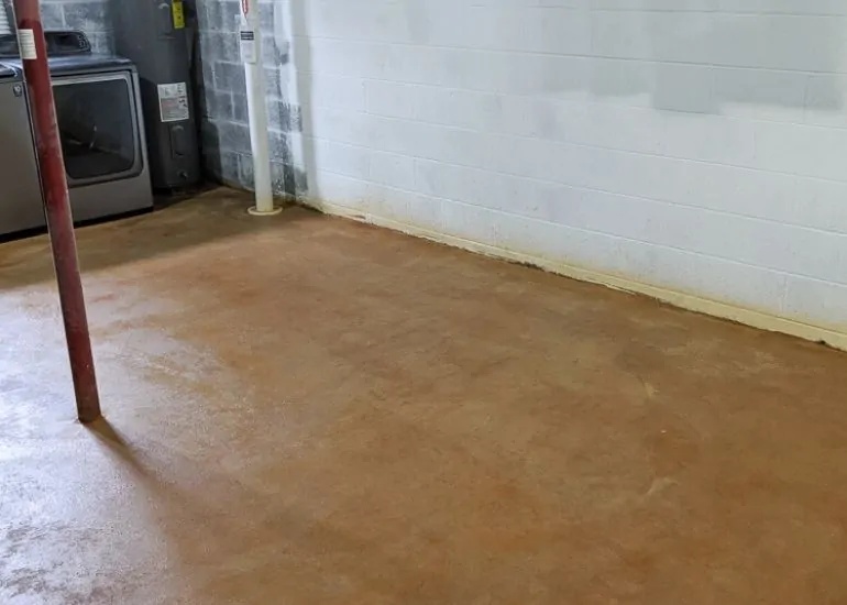 stained concrete floor in Kemiko Malay Tan in basement