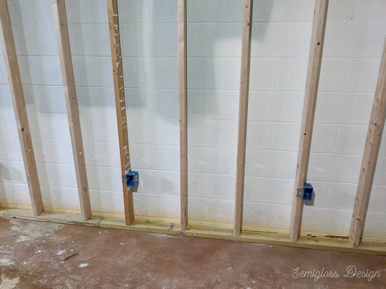 framed basement walls in progress