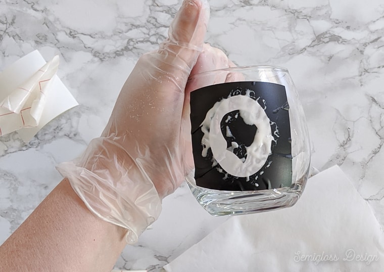 vinyl stencil on glasss covered in etching cream