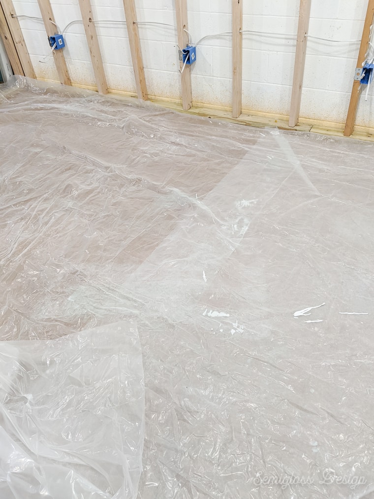 protecting floor with plastic sheeting