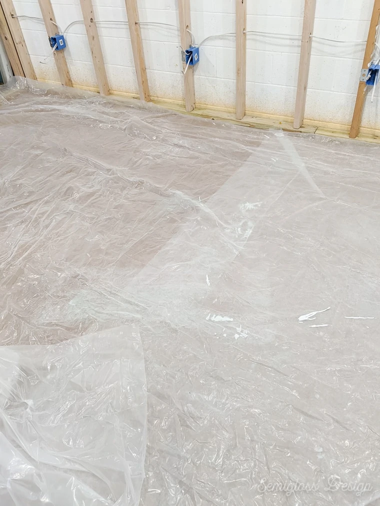 protecting floor with plastic sheeting