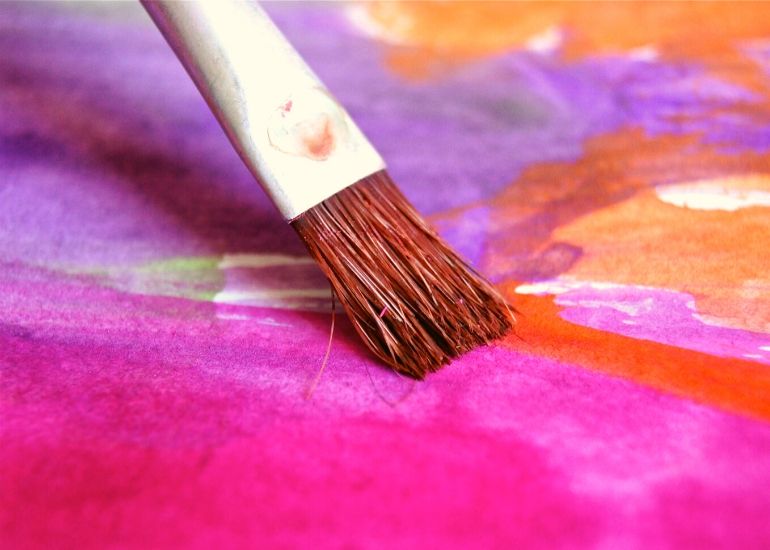 paintrbush painting pink and purple
