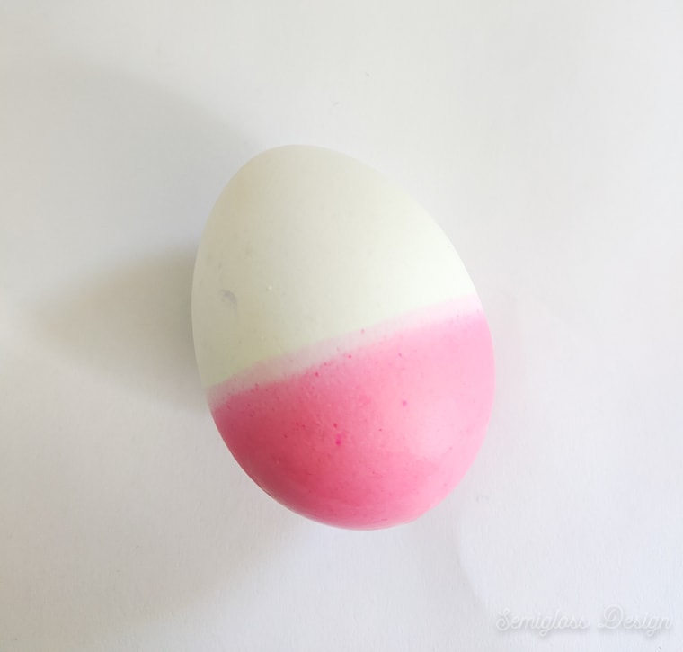 half of egg dyed pink