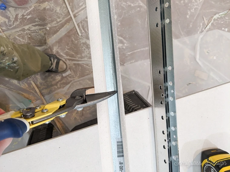 cutting drywall corners with tin snips