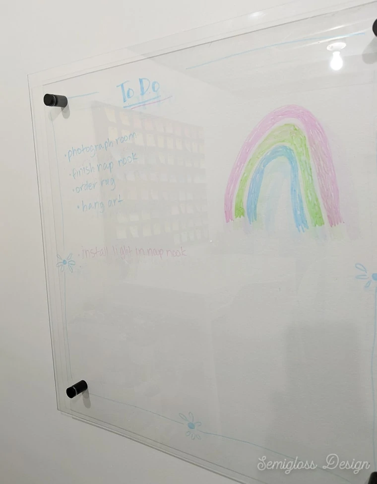 clear dry erase board on white wall