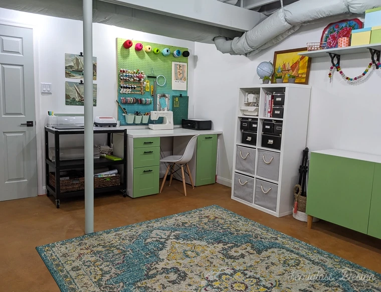 desk and shelving in basement craft room