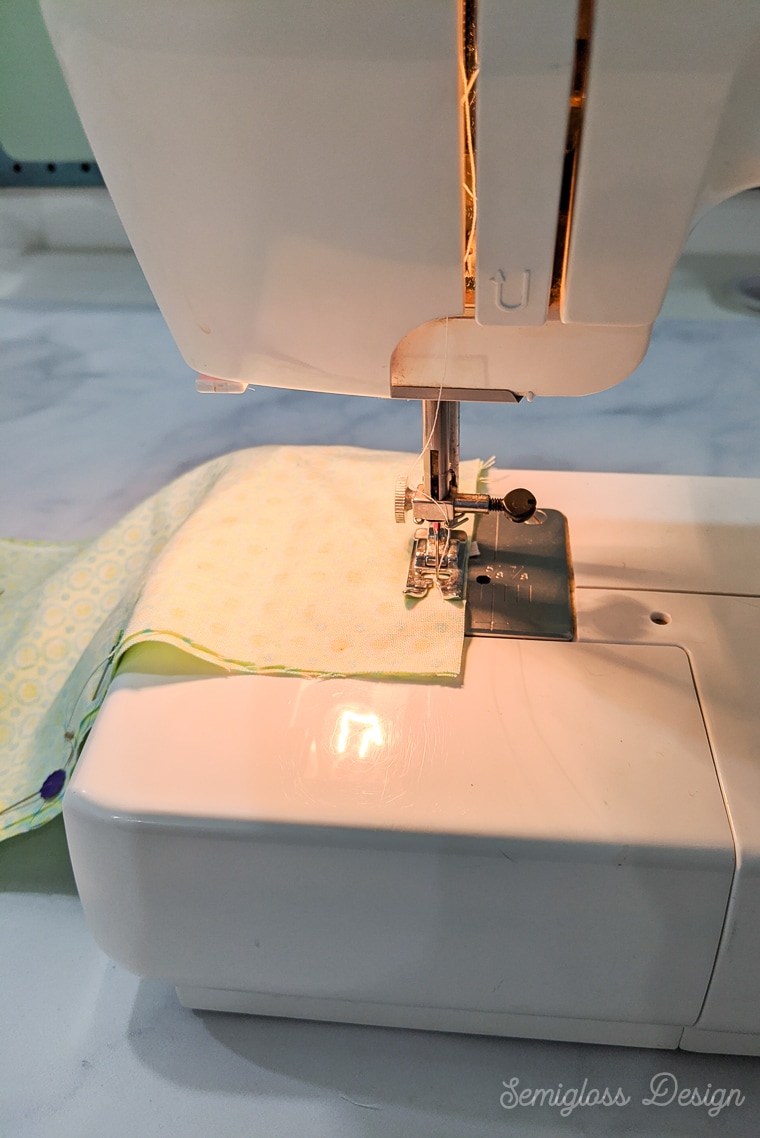 using sewing machine to sew fabric masks