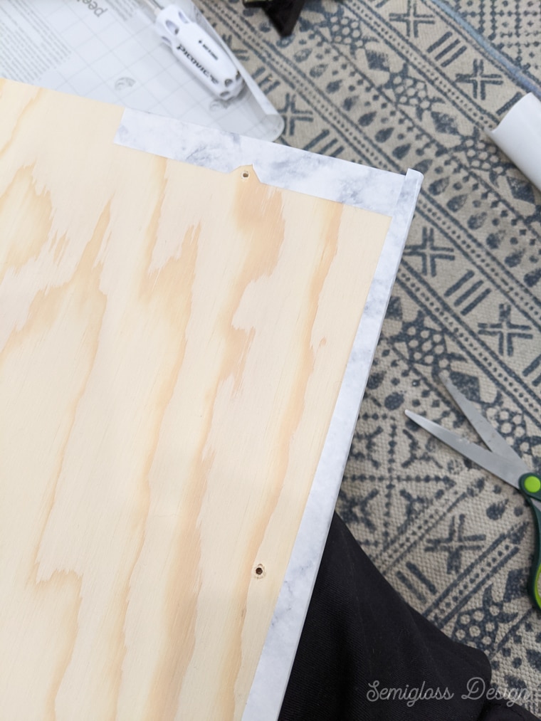 contact paper wrapped around wood