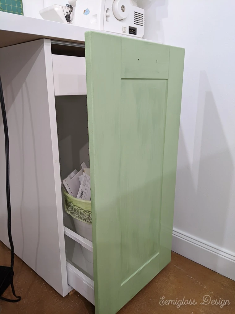 cabinet being painted green