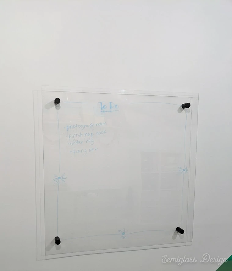 plexiglass dry erase board installed on wall