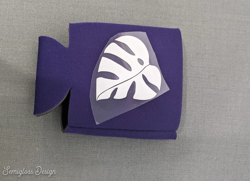 pressing monstera design on koozie