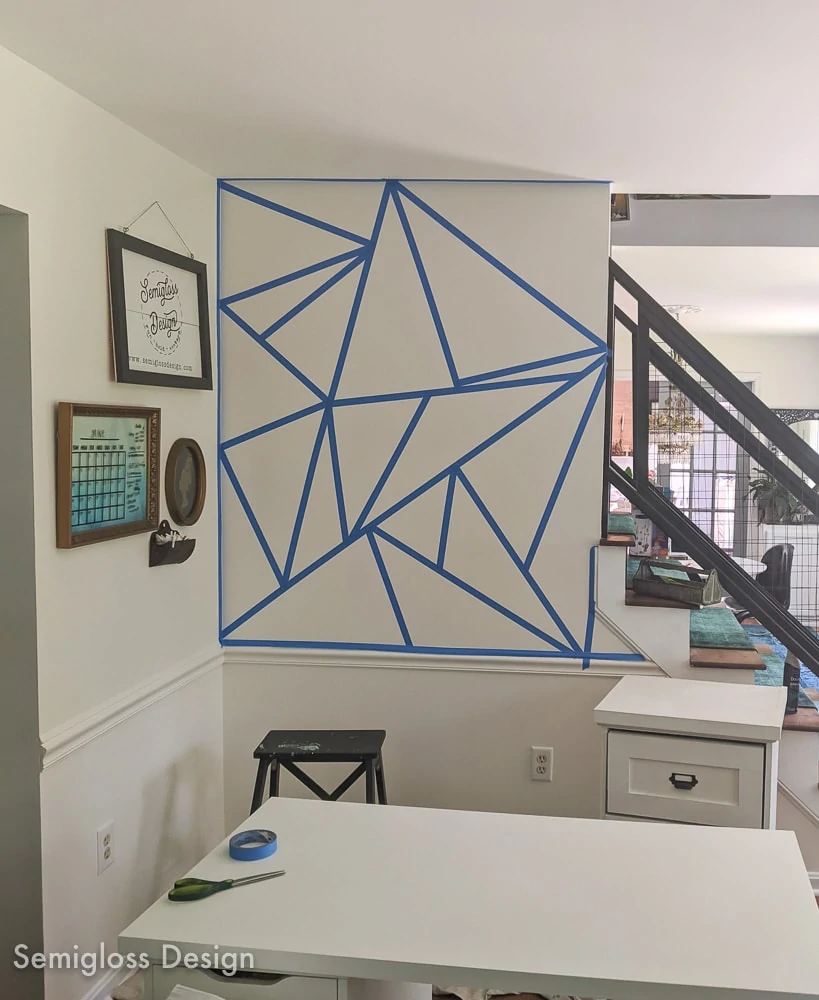 wall taped into geometric pattern