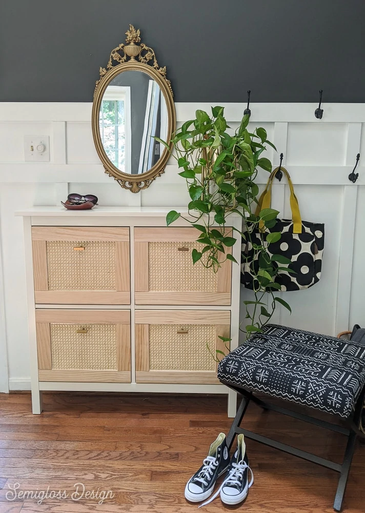 entry with IKEA shoe cabinet and ottoman